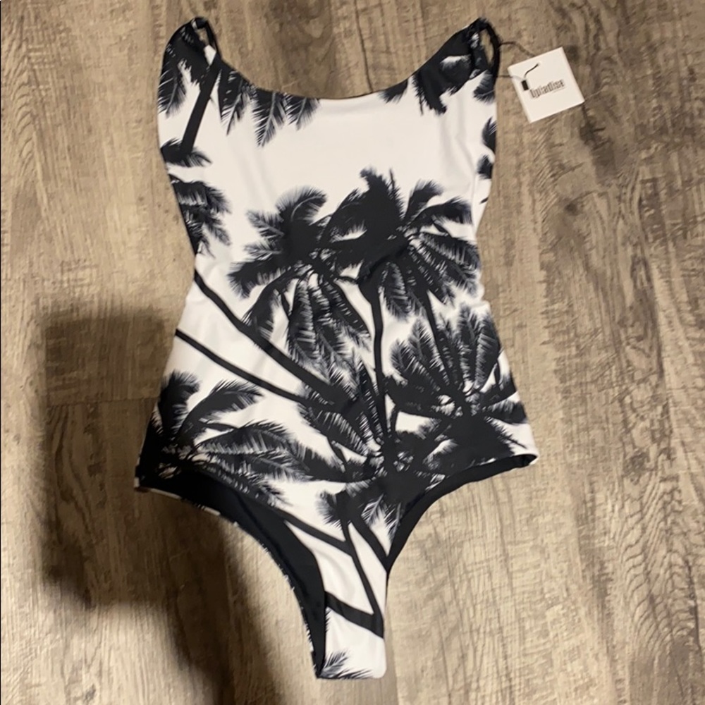 Beautiful cheeky one piece swimming suit!